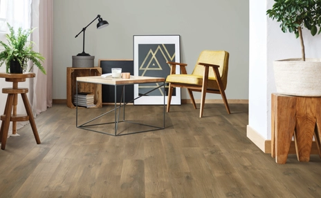 wood look laminate flooring in den with modern furniture